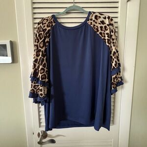 Elegant Blue Top with Leopard Print Sleeves